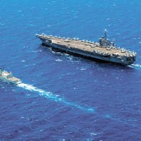 RCN Halifax-class frigate HMCS Calgary steams alongside Nimitz-class aircraft carrier USS John C. Stennis during RIMPAC 2016. Photo by U.S. Navy Mass Communication Specialist 3rd Class Sierra D. Langdon