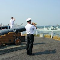 Commander of Maritime Forces Pacific, Rear-Admiral Art McDonald (centre), salutes HMCS Winnipeg as the ship arrives at CFB Esquimalt. Photo by LS Sisi Xu, MARPAC Imaging Services