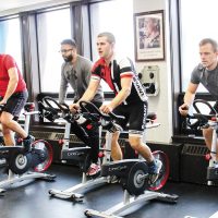 Members of the HMCS Fredericton ‘Sailor for Wishes’ team train with a spin class at the Shearwater gym. Photo by Ryan Melanson, Trident Newspaper