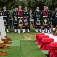 Soldiers from the Canadian Scottish Regiment of Victoria and the Royal New Brunswick Regiment of Fredericton stand at ease alongside the final resting place of four Canadian First World War soldiers who died at the Battle of Hill 70. Photos by MCpl True-dee McCarthy, CF Combat Camera