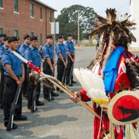 Joe Thorne, a traditional dancer from Cowichan Nation, blesses the candidates before The Raven Program Graduation ceremony Aug. 14. Photo by LS David Gariepy, MARPAC Imaging Services
