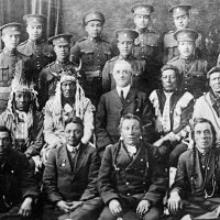 Elders and Indigenous soldiers in the uniform of the Canadian Expeditionary Force circa 1916-17.