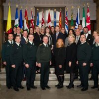 Members of Seamless in Canada pose for a group photo at the Chateau Laurier in Ottawa, Ontario, on Dec. 5. Photo by Private Tori Lake, Canadian Forces Support Unit (Ottawa) Imaging Services