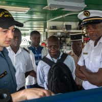 HMCS Kingston Navigating Officer Lt(N) Graham Austin discusses search-and-rescue strategies with Togolese military and government personnel on March 7. Photo by Cpl David Veldman