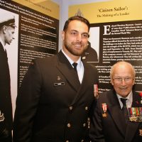 Base Commander, Capt(N) Sam Sader and Cdr (Retired) Peter Chance chat during an unveiling ceremony for the war medals of Cdr Ted Simmons at the CFB Esquimalt Naval and Military Museum
on July 10. Photo by Peter Mallett, Lookout