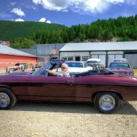 Former Navy Lieutenant Rex Landis behind the wheel of a 1968 Pontiac Beaumont convertible, completely rebuilt by the Rust Valley Restoration crew.