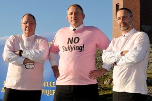 CPO1 Paul Helston, Capt(N) Mike Knippel and RAdm Bill Truelove stand against bullying