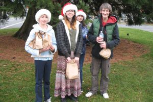 Ten-year-old Emily Tipper handed out bag lunches to the homeless at Christmas