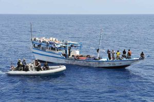 HMCS Regina boarding party approaches fishing dhow