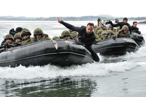 Trident Fury troop transport LS Paul Johnson helps bring a wave of Royal 22nd Regiment soldiers to land