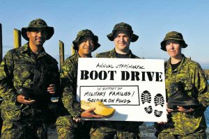 Soldiers advertise annual fundraising boot drive