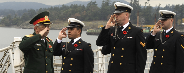 Senior Lieutenant-General Nguyen Chi Vinh, Vietnam Vice-Minister of National Defence, is being piped onboard Her Majestyís Canadian Ship (HMCS) CALGARY during his visit to HMC Dockyard Esquimalt on 1 November 2013. Photo by: Leading Seaman Ogle Henry, MARPAC Imagery Services