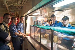 HMCS Regina Command team serves sundaes