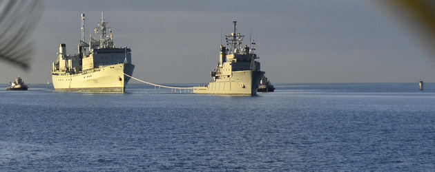 The U.S.Navy fleet ocean tug USNS Sioux tows HMCS Protecteur to Joint Base Pearl Harbor-Hickam.