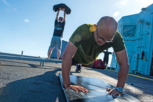 fitness class on the flight deck