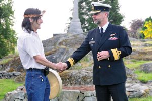 Sunrise Ceremony - Bill Stewart shakes hands with RAdm Bill Truelove