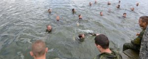 Paratroopers from 3rd Battalion, Princess Patricia's Canadian Light Infantry tread water during helocast training in Poland on June 13, 2014.