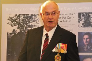 John “Jack” Curry, youngest child of Beatrice and Charles Curry, speaks at the unveiling of “The Curry Contingent” exhibit. 