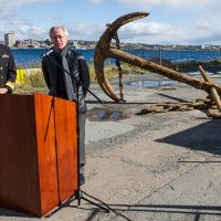 Director of the Naval Museum of Halifax, Richard Sanderson, and RAdm John F. Newton, Commander Joint Task Force Atlantic and Maritime Force Atlantic, make a media announcement about the discovery of a historic anchor.