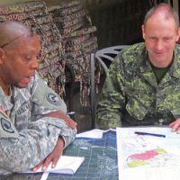 =“ISS, Team, and US, counterparts, discuss, relief, efforts, earthquake, scenari, Kingston, Jamaica, during, Exercise, READY, RENAISSANCE, 15, Feb, 19”