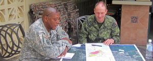 =“ISS, Team, and US, counterparts, discuss, relief, efforts, earthquake, scenari, Kingston, Jamaica, during, Exercise, READY, RENAISSANCE, 15, Feb, 19”