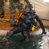 ="Cpl, Pierre-Luc, Auger, climbs, water, following, ice, dive, Deschambault-Grondines, QC, Feb, 19, during, Exercise, Roguish, Buoy'