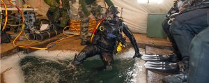 ="Cpl, Pierre-Luc, Auger, climbs, water, following, ice, dive, Deschambault-Grondines, QC, Feb, 19, during, Exercise, Roguish, Buoy'