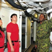 Peruvian firefighters tour HMCS Calgary