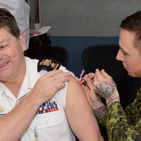 Military member receiving the flu shot