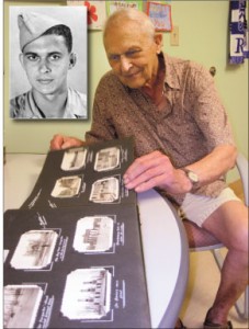 Image by Peter Mallett, Lookout Second World War veteran Rudi Hoenson goes through his photo album as he recalls his prisoner of war experience. 