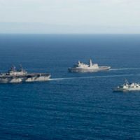 navy ships sailing in formation