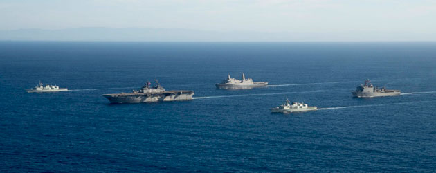 navy ships sailing in formation