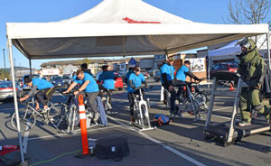 Military divers spin on stationary bikes and run on a treadmill