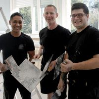 Navy sailors with renovation supplies