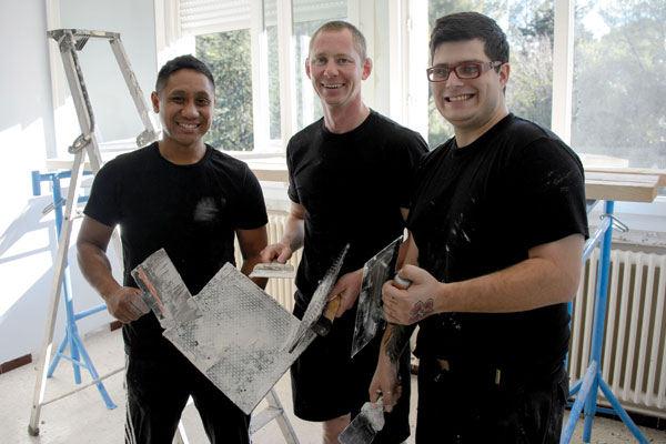 Navy sailors with renovation supplies