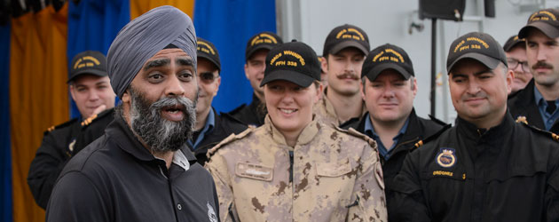 Minister of National Defence Harjit S. Sajjan addresses the ship’s company of HMCS Winnipeg during his visit on Dec. 23, 2015 during Op Reassurance.