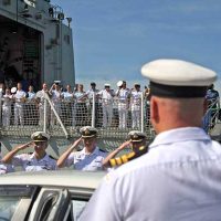 sailor waves farewell to ship