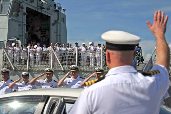 sailor waves farewell to ship