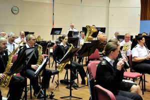 The Naden Band plays for Shoreline Middle School's Grade 8 Concert Band. 