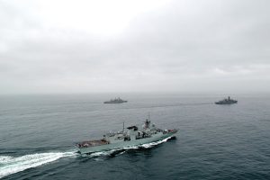 Left to right: Vancouver and Chilean Navy vessels Condell and Prat execute a sunburst formation during the Officer of the Watch manoeuvres serial.