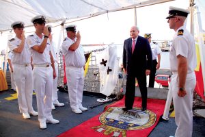 Peruvian Prime Minister, Pedro Cateriano crosses the brow to attend a  reception held onboard HMCS Vancouver on Feb. 22.