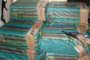 Photo by U.S. Coast Guard  Bales of cocaine jettisoned from a suspected smuggling boat and retrieved from the Eastern Pacific Ocean lie stacked aboard HMCS Saskatoon.  The bales were seized by a U.S. Coast Guard Law Enforcement Detachment embarked on Saskatoon.