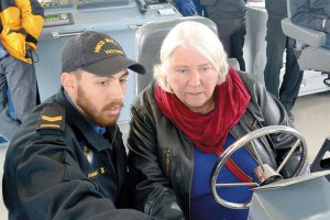 Penelope Tew receives some driving instruction from Leading Seaman Manuel Dussault-Gomez during HMCS Malahat’s annual Family Appreciation Day.