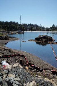 Peter Mallett, Lookout Booms deployed in Plumber Bay by DND staff on May 8 helped contain a fuel spill that occurred in the overnight hours when a privately owned barge ran aground.