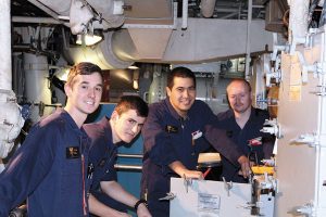 From left to right: New Zealand sailors Able Marine Technician (AMT) Vance Bell, AMT Robert Jackson, AMT Tomi Fataaiki and Ordinary Marine Technician Damon Dick-Carson work on board HMCS Ottawa.