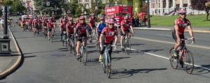 Boomer’s Legacy team members approach the finish line as they complete the Boomer’s Legacy ride in Victoria, B.C., June 12.   Photo by Cpl Brent Kenny, MARPAC Imaging Services