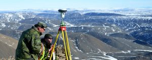 MCpl Corey Quinn and Cpl Mike Brajak from Canadian Forces Mapping and Charting Establishment Ottawa, Ontario mark boundary lines at the Grant High Arctic Data Communications System on June 11 during Operation NEVUS.  Photos by PO2 Belinda Groves, Task Force Imagery Technician