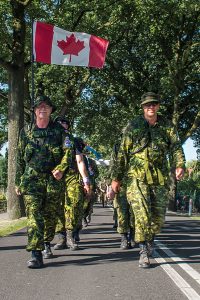 Members of Joint Task Force Nijmegen 2016 contingent press-ahead in the countryside during day 2 of marches at Nijmegen, The Netherlands on July 20. Photo: LS Brad Upshall, 12 Wing Imaging Services, Shearwater, N.S