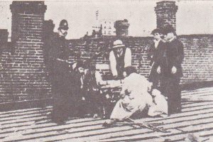 Inspecting the engine of Bryant’s plane after his crash at Victoria on August 6, 1913.