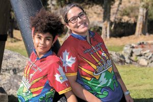 LS Andrée Noye (right) and one of her Junior Riders, Desiree Young, are all smiles at a Tour de Rock hang out.